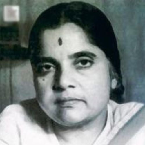 Black and white photographic portrait of Durgabai Deshmukh looking towards the camera, wearing a light sari.